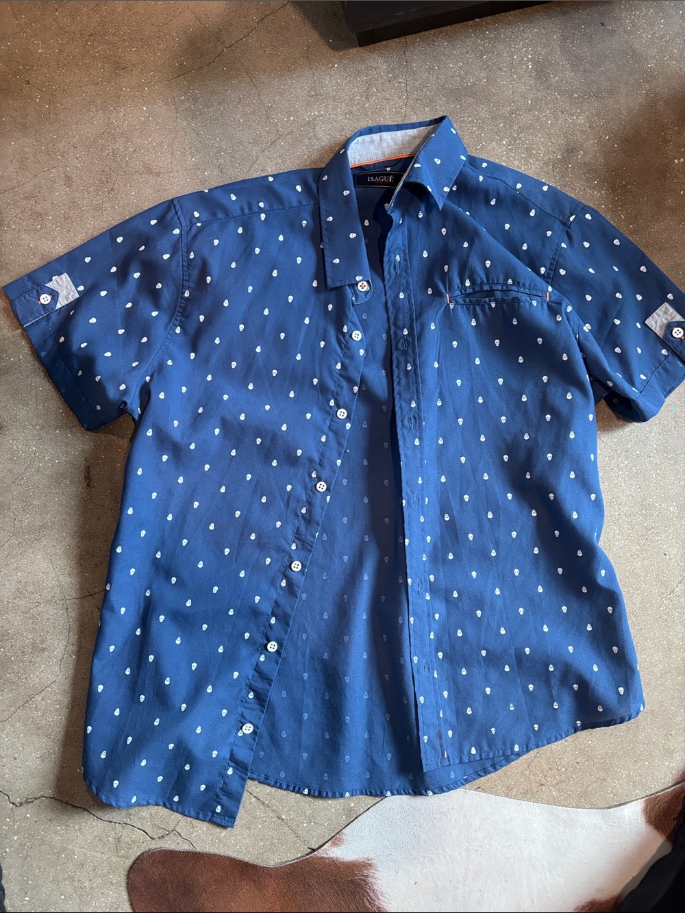 navy blue button up with white skull pattern